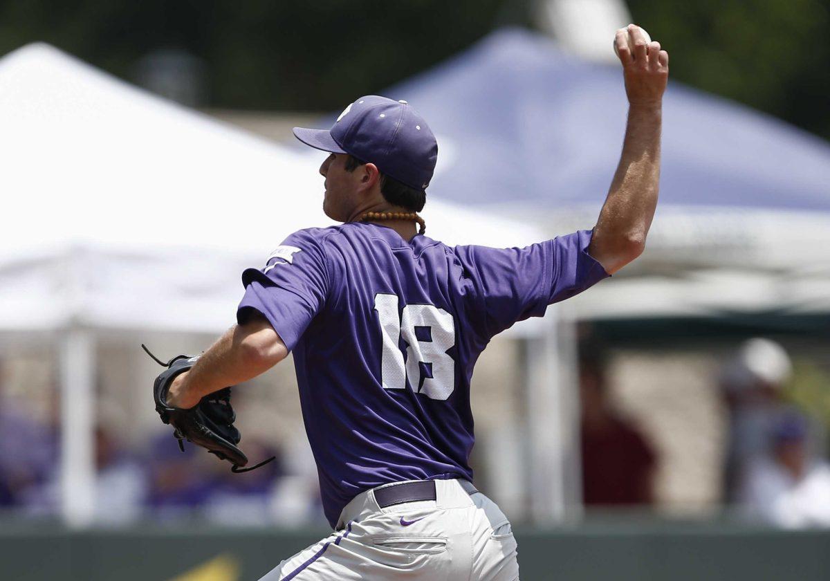 TCU pitcher Preston Morrison (18) works against Texas A&amp;M during the first inning of a super regional of the NCAA college baseball tournament in Fort Worth, Texas, Sunday, June 7, 2015. (AP Photo/Jim Cowsert)