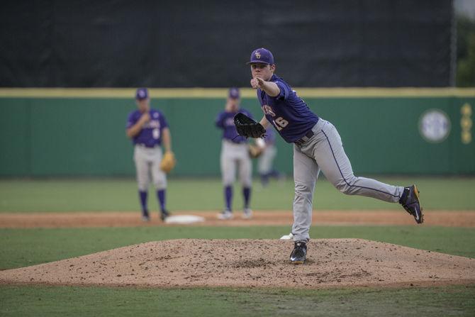 LSU sophomore pitcher Jared Poche’ (16) warms up in between innings during the Tiger's 6-3 final victory in the NCAA Super Regional against ULL on Sunday, June 7, 2015 in the Alex Box Stadium.