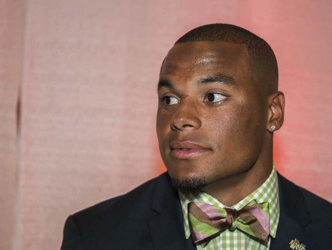 Mississippi State senior quarterback, Dak Prescott (15), sits for Q&amp;A during SEC Media Days on Tuesday, July 14, 2015 in Hoover, Alabama.