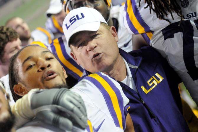 LSU head coach, Les Miles, leads the Tigers in singing their Alma Mater after a 23-17 victory against Texas A&amp;M in Kyle Field, College Station on November 27.