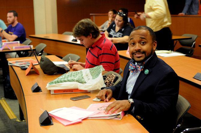 Senator Vernon Dunn prepares for business Wednesday, Aug. 26, during the Student Government meeting in the Student Union.