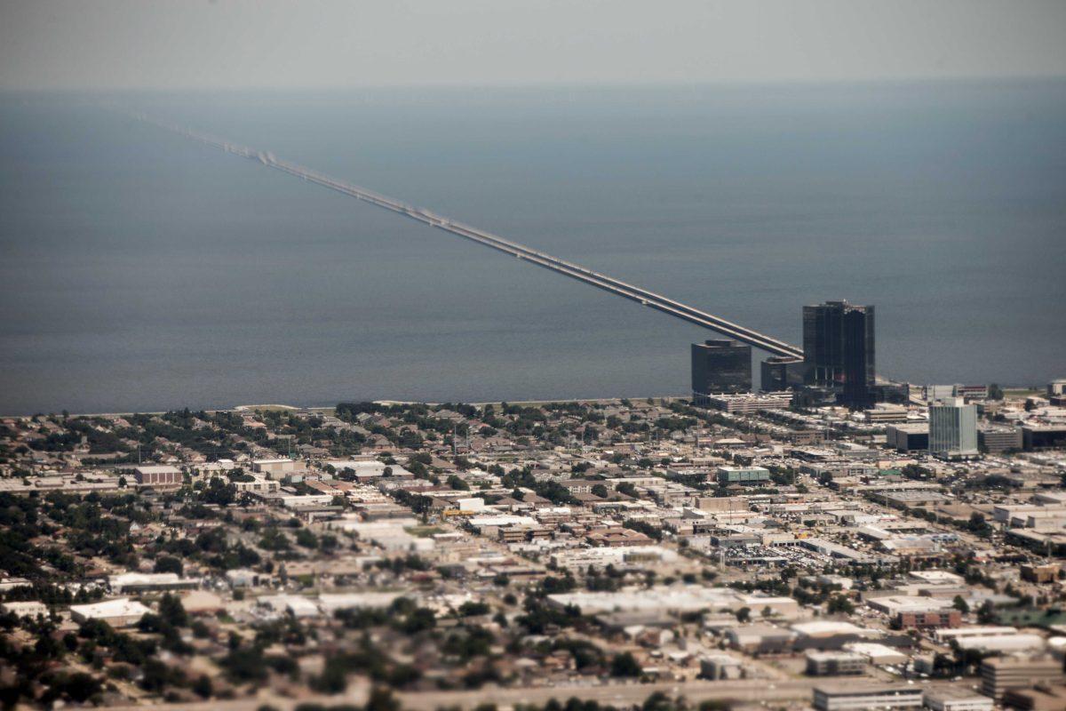 A view of the Lake Pontchartrain Causeway from Air Force One, carrying President Barack Obama, before landing at Louis Armstrong International Airport in New Orleans, Thursday, Aug. 27, 2015, for the 10th anniversary since the devastation of Hurricane Katrina. (AP Photo/Andrew Harnik)