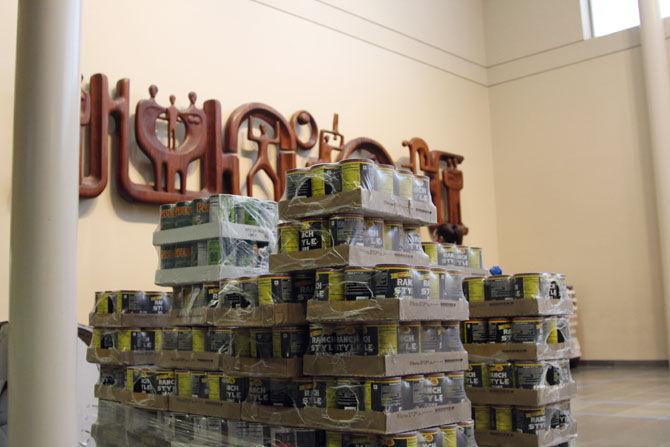 Cans of food stock up at the Louisiana Art and Science Musuem on Wednesday, Aug. 26, 2015 as teams get ready to assemble their structures.