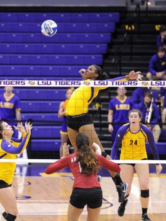 LSU sophomore middle blocker Khourtni Fears (1) spikes the ball Sunday, October 27, 2013 during the Tigers' 3-2 victory against Arkansas at the PMAC.