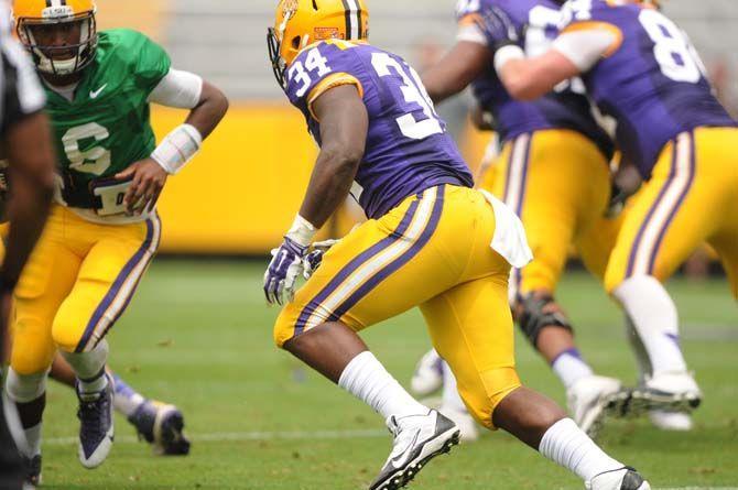 LSU football coach Les Miles names Brandon Harris as the starting quarterback against McNeese