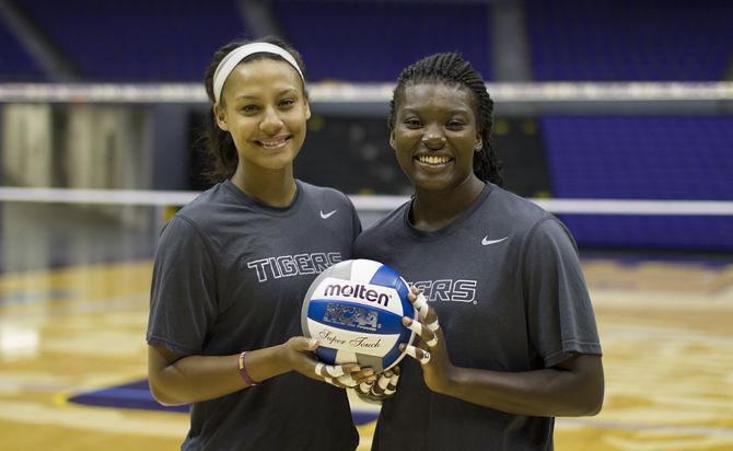 Sophomore outside hitters Mimi Eugene (10) and Gina Tills (12) are expected to be a major force on offense this season, Aug. Tuesday 25, 2015 in the Pete Maravich Assembly Center.