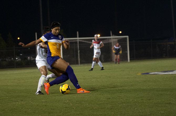 LSU sophomore Jorian Baucom (5) defends the ball during the Tigers' 4-1 defeat against Western Kentucky on Friday, Aug. 28, 2015, at LSU Soccer Stadium.