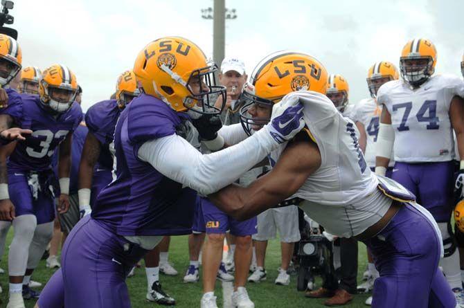 LSU shophomore DB Ed Paris and LSU sophomore WR Malachi Dupre on a drill on Tuesday Mar. 14, 2015, at the football operations facility.