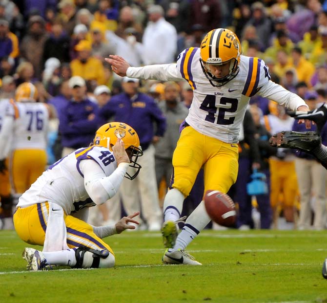 <p>LSU freshman place kicker Colby Delahoussaye (42) converts a point after touchdown during the Tiger's 34-10 victory against Texas A&M. </p>