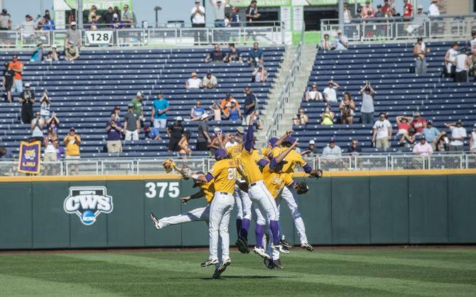 LSU baseball players celebrate after the Tigers' 5-3 victory against Cal State Fullerton in the NCAA Men's College World Series on Tuesday, June 16, 2015 at the TD Ameritrade Park in Omaha.