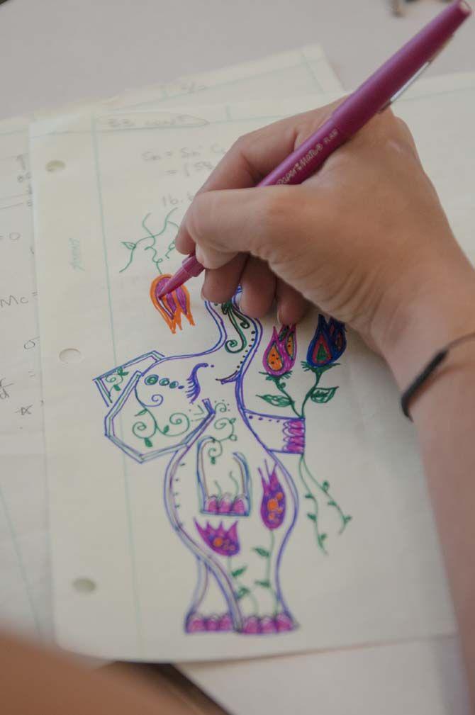 University mechanical engineering senior, Alec Rozas, uses doodling to help her focus more in her classes.