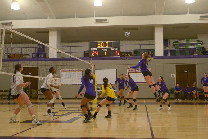 LSU senior outside hitter Katie Lindelow (7) hits the ball during the spring tournament on Saturday, Feb. 21, 2015 in the auxiliary gym.