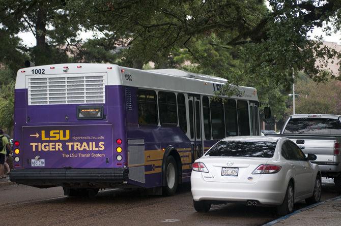 A Purple Trail bus departs on Thursday, Sept. 10, 2015, from one of its main stops located near the Journalism Building. A new Student Union stop was recently added to this bus route.