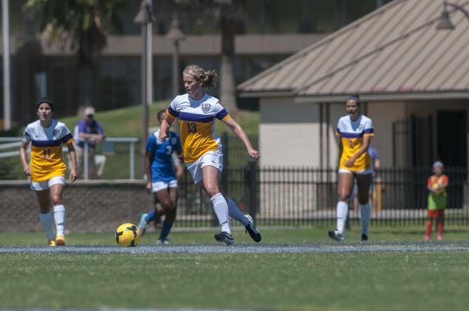 LSU senior midfielder Alex Arlitt (14) runs the ball up the field during the Tigers&#8217; 1-0 victory on Sunday, September 13, 2015 in LSU&#8217;s Soccer Stadium.