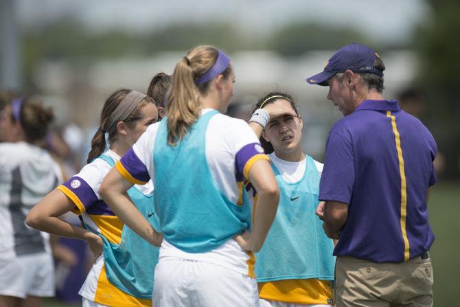 LSU soccer head coach Brian Lee talks to some of his players in the sidelines during the Tigers' 4-0 victory over Indiana on Sunday, Sept. 06, 2015 at the LSU Soccer Stadium.