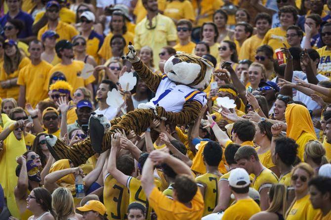 LSU's Mike the Tiger crowd-surfs during the Tigers' 45-21 victory against Auburn on Saturday, Sept.19, 2015, in Tiger Stadium.