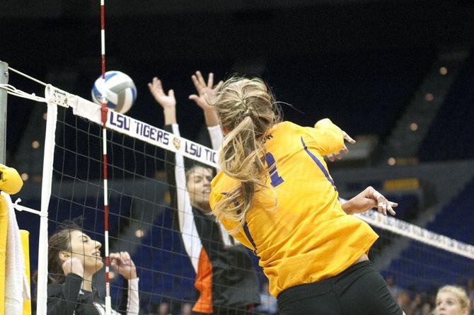 LSU senior Katie Lindelow (7) breaks through the opposing defense Sunday, Sept. 13, 2015, during the Tigers' 3-1 loss to Miami in the PMAC.