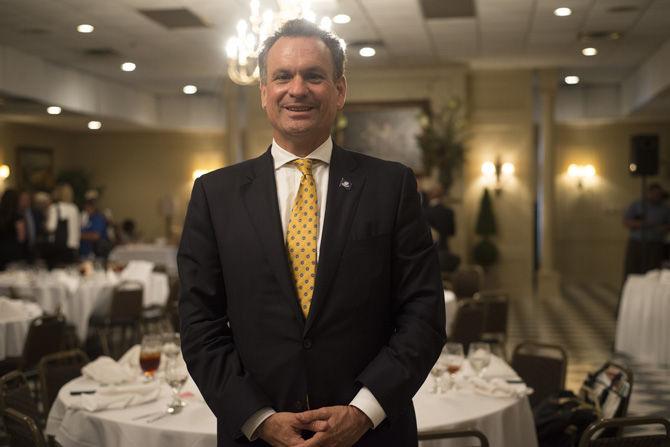 Lt. governor candidate John Young talks to attendees on Thursday, Sept. 17, 2015, after the LWVision 2015 Reality Check Luncheon at Drusilla Place in Baton Rouge.