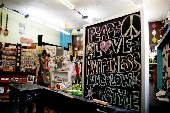 A colorful sign greets customers at Honeymoon Bungalow on Government Street.