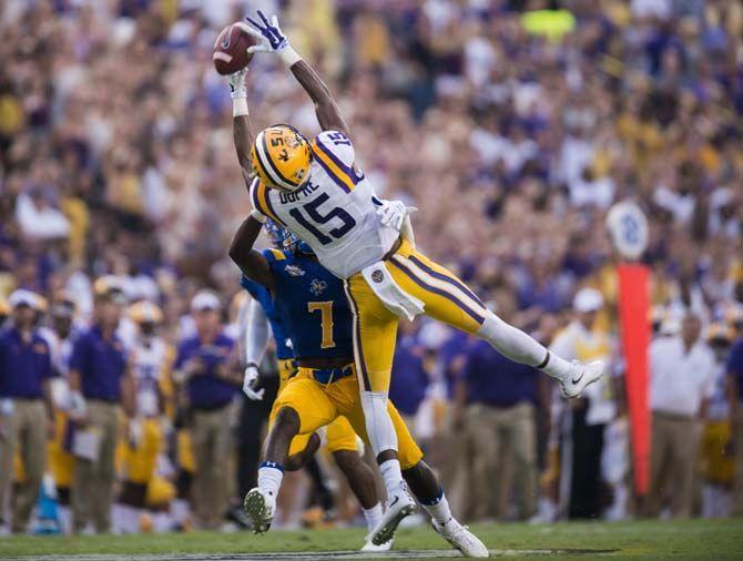 Prior to weather delays, LSU sophomore wide receiver Malachi Dupre (15) misses a catch during the game Saturday, Sep. 5, 2015, against McNeese State in Tiger Stadium.