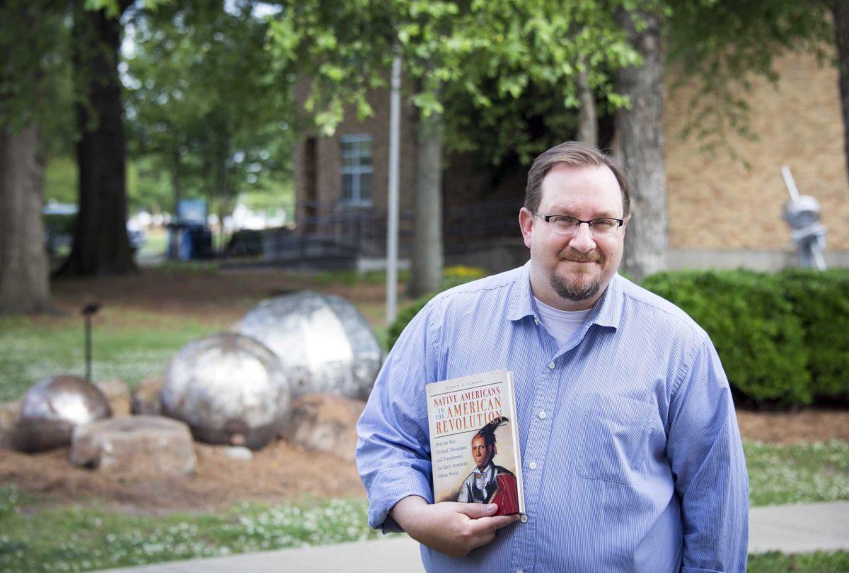 This undated photo provided by Delta State&#160;University shows history professor Ethan Schmidt, who was killed Monday, Sept. 14, 2015, at&#160;Delta&#160;State&#160;University in Cleveland, Miss. A college instructor suspected in the fatal killing of Schmidt was still at large late Monday.