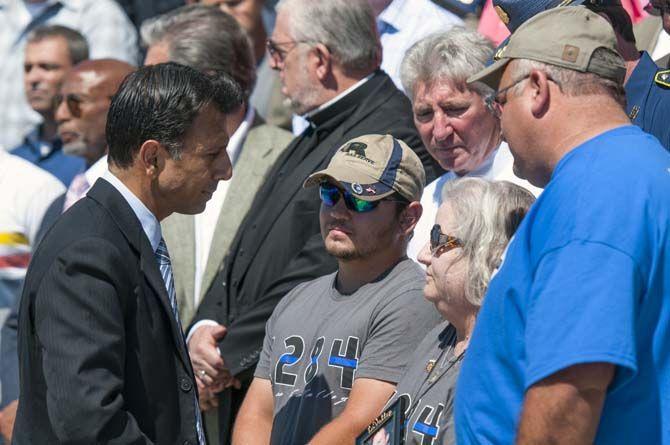 Jindal holds prayer rally for fallen officers