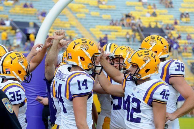 LSU's special team gathers in a huddle before the Tigers play the Cowboys on Sept. 05, 2015, in Tiger Stadium.