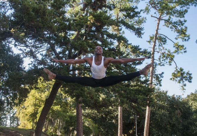 LSU alum Le'Brian Patrick practices contemporary ballet moves on Tuesday, Sept. 22, 2015, in the Greek Amphitheater.