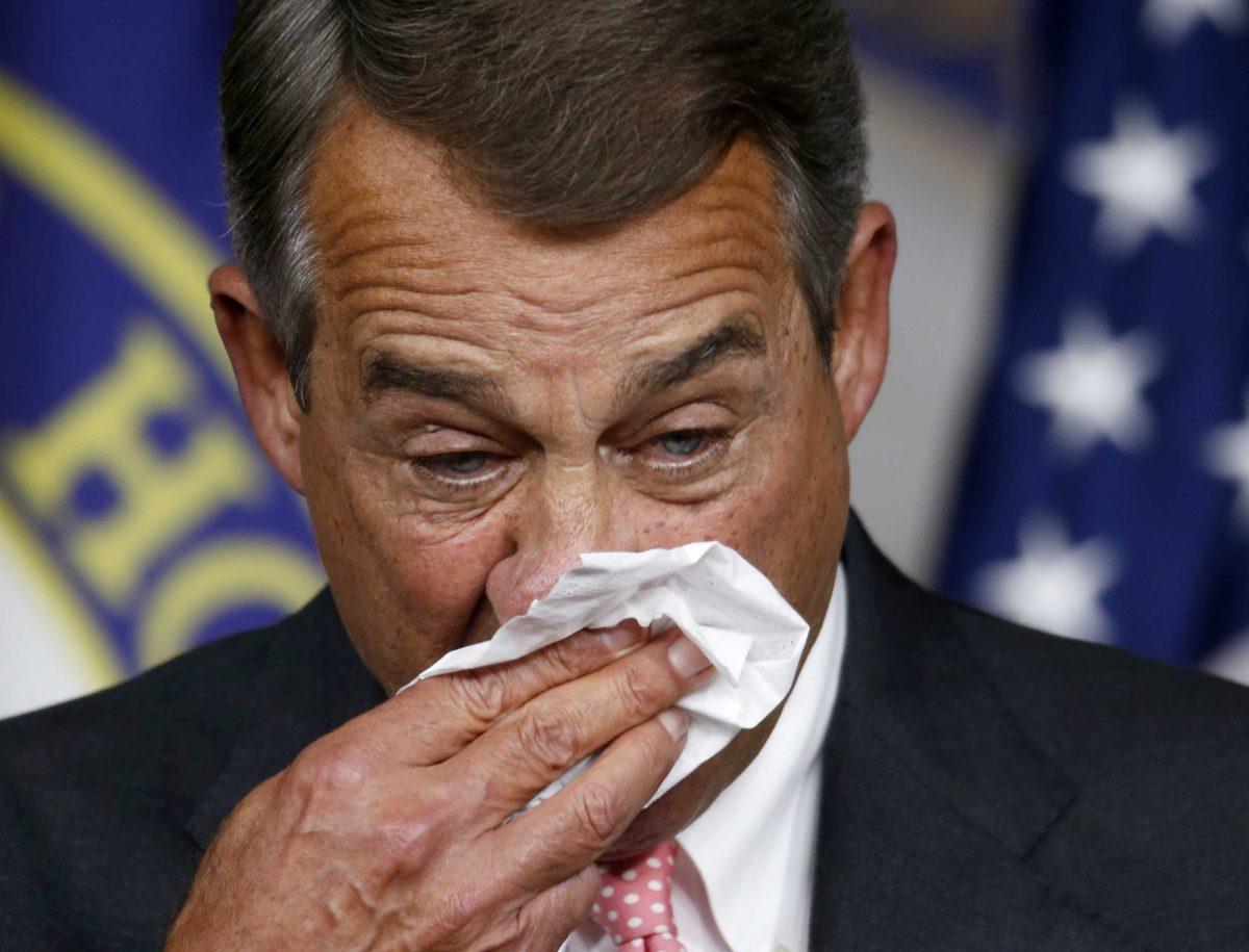 House Speaker John Boehner of Ohio wipes his face during a news conference on Capitol Hill in Washington, Friday, Sept. 25, 2015. In a stunning move, Boehner informed fellow Republicans on Friday that he would resign from Congress at the end of October, stepping aside in the face of hardline conservative opposition that threatened an institutional crisis. (AP Photo/Steve Helber)