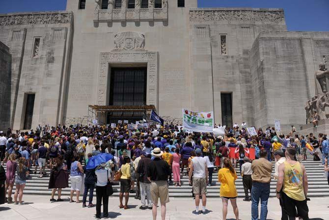 Protestors gather on the steps of the Louisiana State Capitol building Thursday, Apr. 30, 2015 to protest higher education budget cuts.