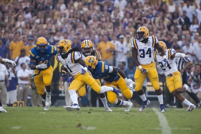 Freshman Defensive Back Donte Jackson returns the ball during kickoff as the Tigers take on the Cowboys prior to the rain cancelation on Sept. 05, 2015, in Tiger Stadium.