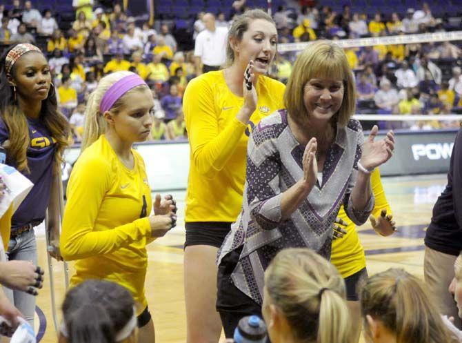 LSU volleyball head coach Fran Flory gives a pep talk to her team during the loss aginst Kentucky Wednesday, September 24, 2014 in the PMAC.