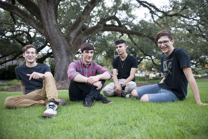 New Orleans based pop band Shy Gemini's members Taylor Dudenhefer (left), William Theriot, Seishin LeBlanc and Brennan Ory (right) pose on Sunday, Sept. 27, 2015, outside of LSU Bookstore.