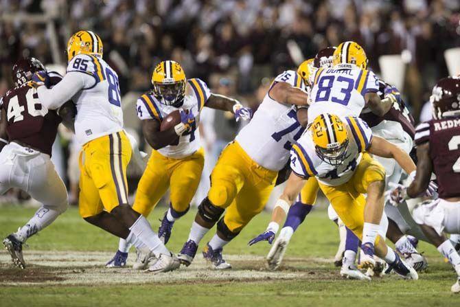 LSU Sophomore Running Back, Darrel Williams (34), breaks through the middle during the Tigers 21-19 win over Mississippi State on Saturday, at Davis Wade Stadium.