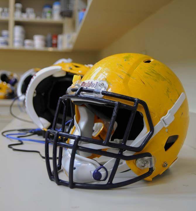 Helmets for the LSU football team that have been assigned with new technology to record size and strength of impacts to the head on Wednesday Sept. 02, 2015, in LSU's Football Operations building.