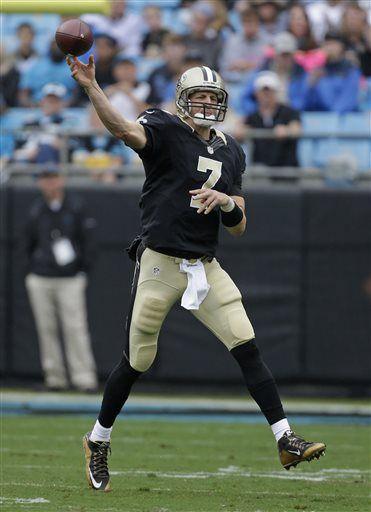 New Orleans Saints' Luke McCown (7) throws a pass against the Carolina Panthers in the first half of an NFL football game in Charlotte, N.C., Sunday, Sept. 27, 2015. (AP Photo/Bob Leverone)