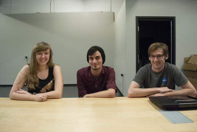 University digital art seniors Tylar Spencer (left), Cameron Bragg (middle) and computer science and physics senior Craig Jones (right) are in the process of developing their own video game, entitled "Space Shrimp" on September 7, 2015 at After Hours Lab. LLC.