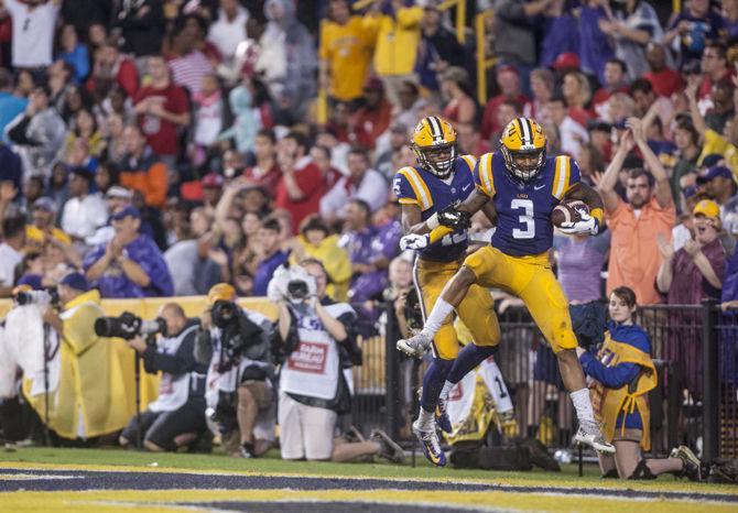 LSU freshman wide receiver Tyron Jhonson celebrates scoring a touchdown during the Tigers&#8217; 48- 20 victory against Western Kentucky on Saturday, Oct. 24, 2015 in Tiger Stadium.