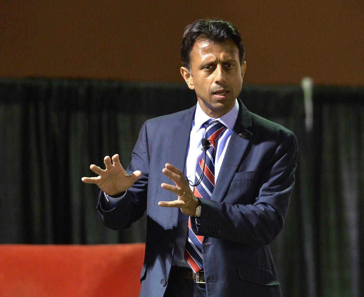 FILE - In this Oct. 29, 2014 file photo, Louisiana Gov. Bobby Jindal speaks in Louisville, Ky. Jeb Bush and Mitt Romney are getting most of the attention in the early days of the Republican race for president. But as they court the party&#8217;s elite donors, some potential 2016 candidates who are to the right are just as eagerly chasing early support among evangelicals and social conservatives. (AP Photo/Timothy D. Easley, File)