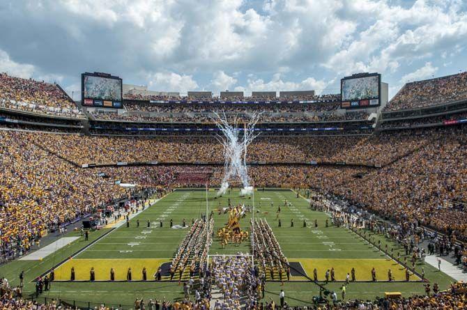 <p>LSU football team rushes the field before the Tigers' 45-21 victory against Auburn on Saturday, Sept.19, 2015, in Tiger Stadium.</p>