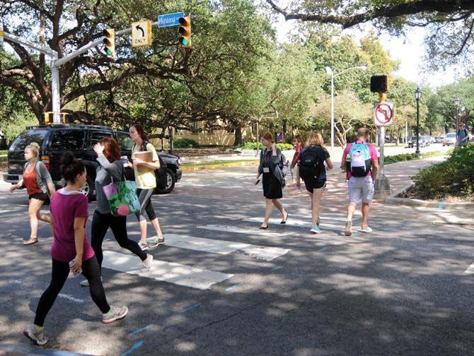 LSU Student Government is looking into installing lighted crosswalks in an effort to make the designated walking areas more visible at night.