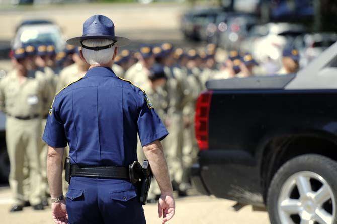 Louisiana State Troopers line up the next generation of troopers prior to the rally on Monday Sept. 14, 2015, at the Louisiana State Capitol.