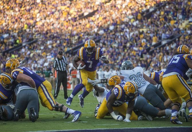 LSU sophomore running back Leonard Fournette (7) rushes to score a touchdown during the Tigers' 44-22 victory against Eastern Michigan on Saturday, Oct. 03, 2015 in Tiger Stadium.