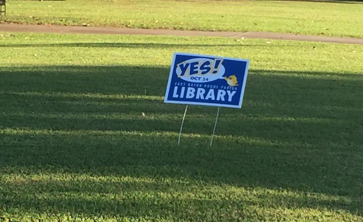 The people campaigning to refund the library not only put up signs, pass out flyers and wear buttons, but they also participate in a social media campaign.