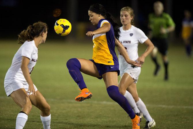 LSU sophomore Jorian Baucom plays the ball in the air Friday, Sept. 5, 2015, during the Tigers' 1-1 tie against Ball State at LSU Soccer Stadium.