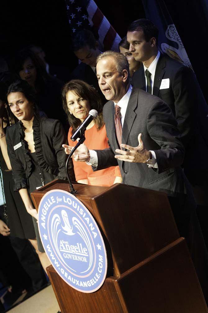 Scott Angelle stands with family and supporters as he makes his concession speech on Saturday, Oct. 24, 2015, at the Acadiana Center for the Arts in Lafayette.