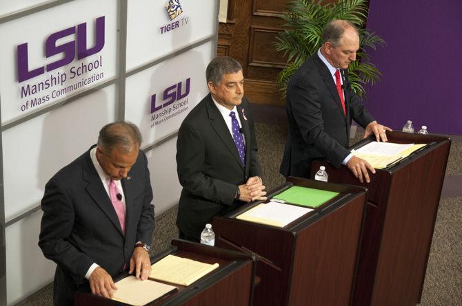 Gubernatorial candidates Scott Angelle, Jay Dardenne, and John Bel Edwards await questioning during the final gubernatorial debate on Oct. 21, 2015, in the Holliday Forum.