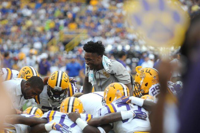 LSU safety Jalen Mills hypes up the players during the Tigers vs. the Cowboys on Sept. 05, 2015, in Tiger Stadium.