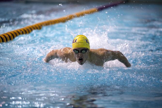 LSU freshman swimmer Alarii Levreault-Lopez swims in the mens' 100 yard butterfly Friday, Sept. 25, 2015, during the LSU Swimming and Diving meet in the Natatorium.