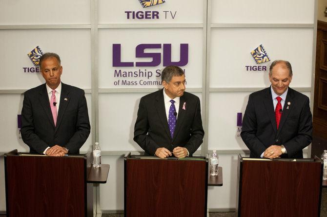 Gubernatorial candidates Scott Angelle, Jay Dardenne, and John Bel Edwards await questioning during the final gubernatorial debate on Oct. 21, 2015, in the Holiday Forum.